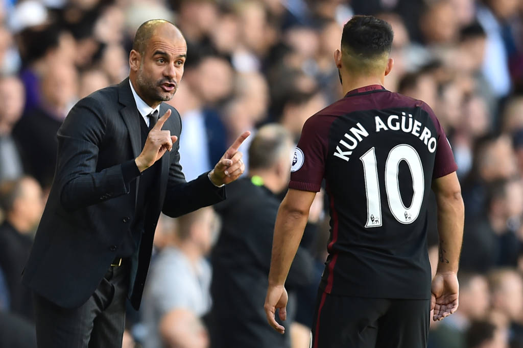 Manchester City's Spanish manager Pep Guardiola (L) gestures to Manchester City's Argentinian striker Sergio Aguero during the English Premier League football match between Tottenham Hotspur and Manchester City at White Hart Lane in London, on October 2, 2016. / AFP PHOTO / Glyn KIRK / RESTRICTED TO EDITORIAL USE. No use with unauthorized audio, video, data, fixture lists, club/league logos or 'live' services. Online in-match use limited to 75 images, no video emulation. No use in betting, games or single club/league/player publications. /