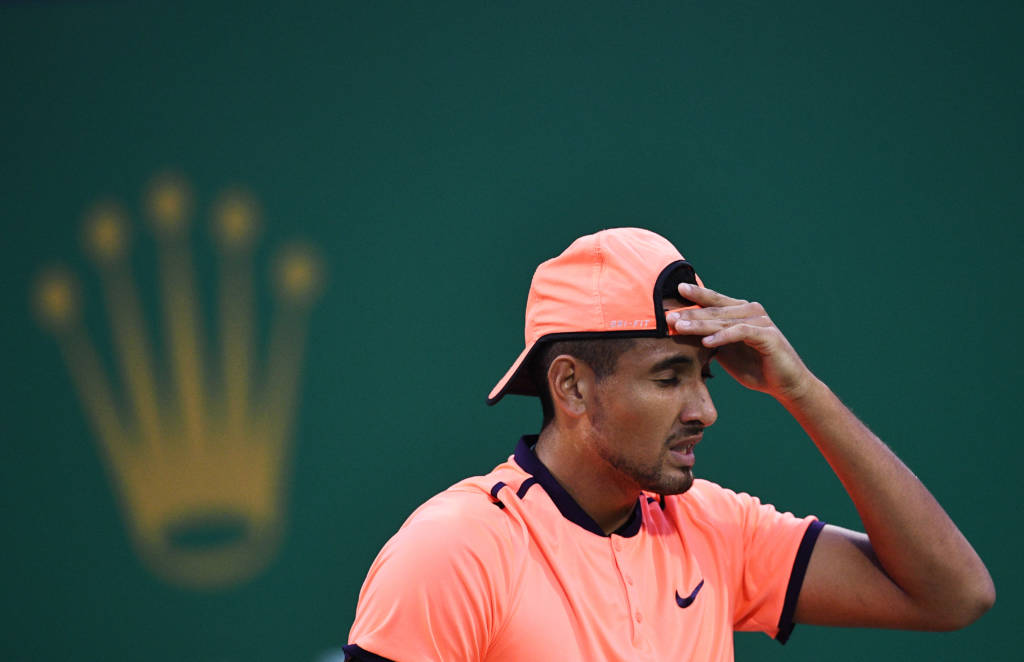 Nick Kyrgios of Australia reacts to his serve against Mischa Zverev of Germany during their men's singles match at the Shanghai Masters tennis tournament in Shanghai on October 12, 2016. / AFP PHOTO / JOHANNES EISELE / The erroneous mention[s] appearing in the metadata of this photo by JOHANNES EISELE has been modified in AFP systems in the following manner: [Australia] instead of [Canada]. Please immediately remove the erroneous mention[s] from all your online services and delete it (them) from your servers. If you have been authorized by AFP to distribute it (them) to third parties, please ensure that the same actions are carried out by them. Failure to promptly comply with these instructions will entail liability on your part for any continued or post notification usage. Therefore we thank you very much for all your attention and prompt action. We are sorry for the inconvenience this notification may cause and remain at your disposal for any further information you may require.