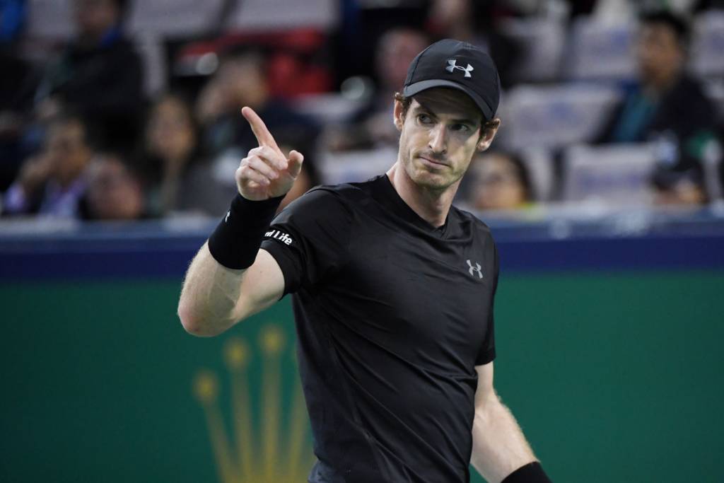 Andy Murray of Britain reacts after winning a point against Lucas Pouille of France during their men's singles match at the Shanghai Masters tennis tournament in Shanghai on October 13, 2016. / AFP PHOTO / WANG ZHAO