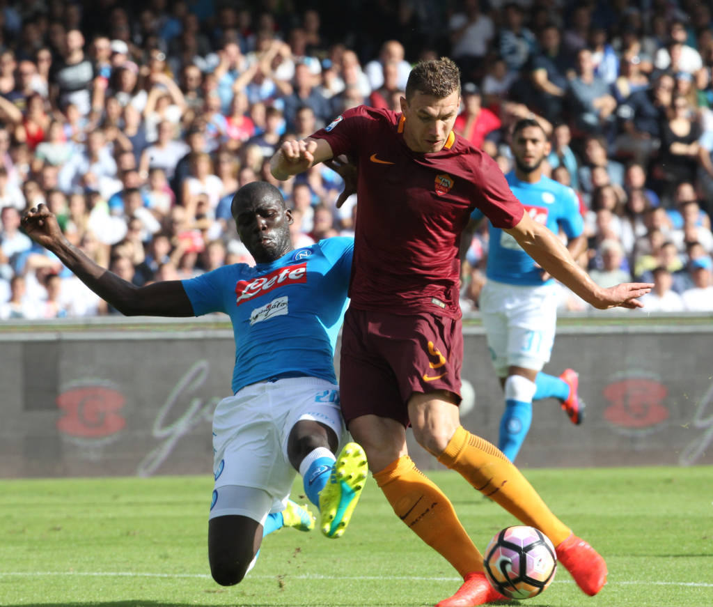 Dzeko foi o destaque do jogo, com dois gols (Foto: Carlo Hermann/AFP) 