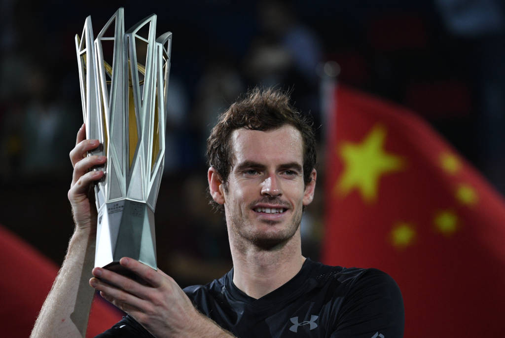 Andy Murray of Britain holds his trophy after winning his men's singles finals match against Roberto Bautista Agut of Spain at the Shanghai Masters tennis tournament in Shanghai on October 16, 2016 / AFP PHOTO / JOHANNES EISELE