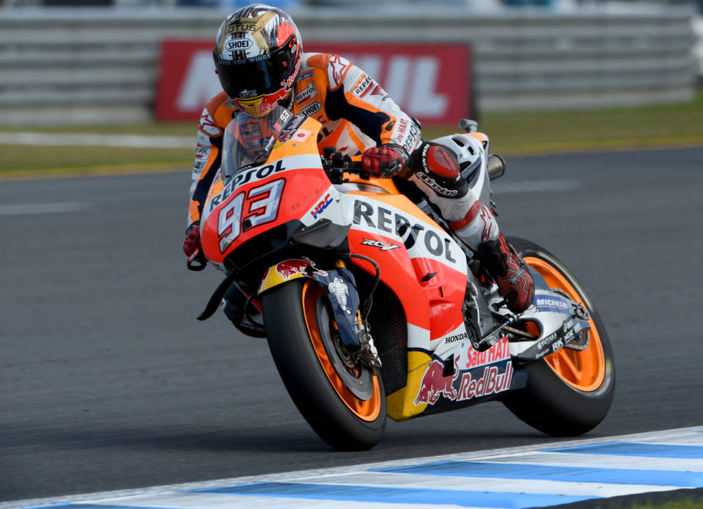Japanese Grand Prix winner Repsol Honda Team's Spanish rider Marc Marquez drives his motorcyle during the MotoGP race at the Japanese Grand Prix in the Twin Ring Motegi circuit in Motegi on October 16, 2016. / AFP PHOTO / TOSHIFUMI KITAMURA