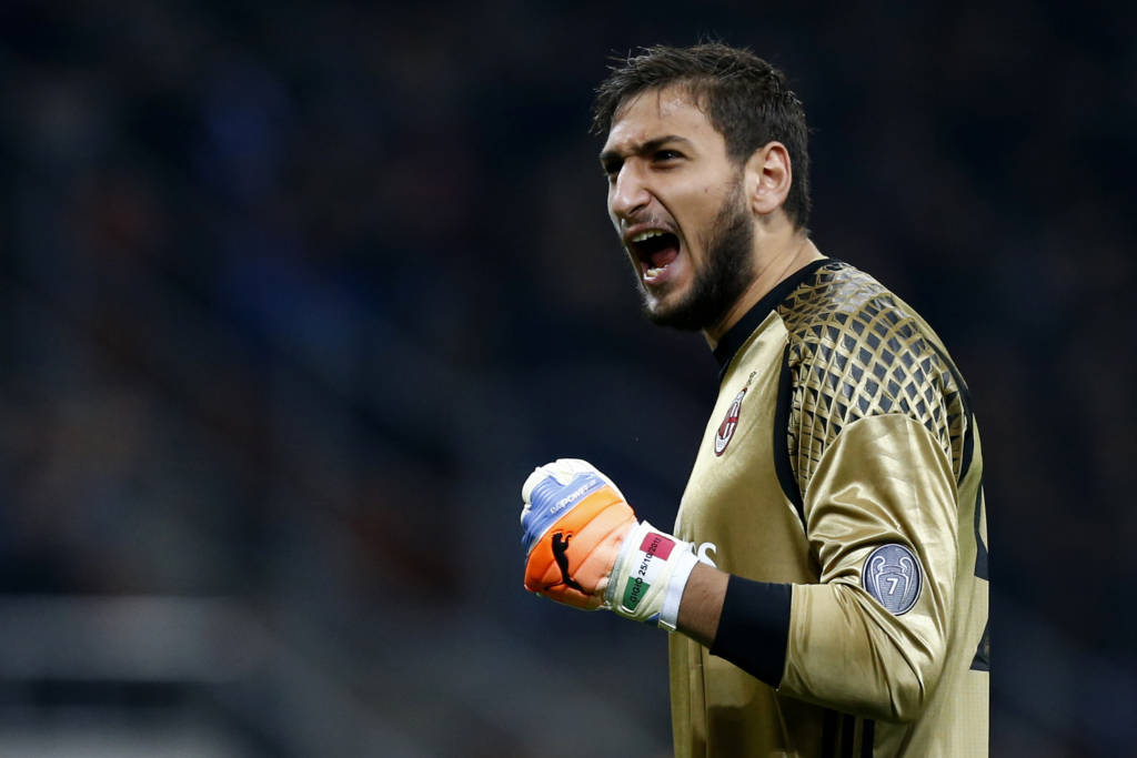 AC Milan's goalkeeper Gianluigi Donnarumma reacts during the Italian Serie A football match AC Milan versus Juventus on October 22, 2016 at the San Siro Stadium in Milan. / AFP PHOTO / MARCO BERTORELLO