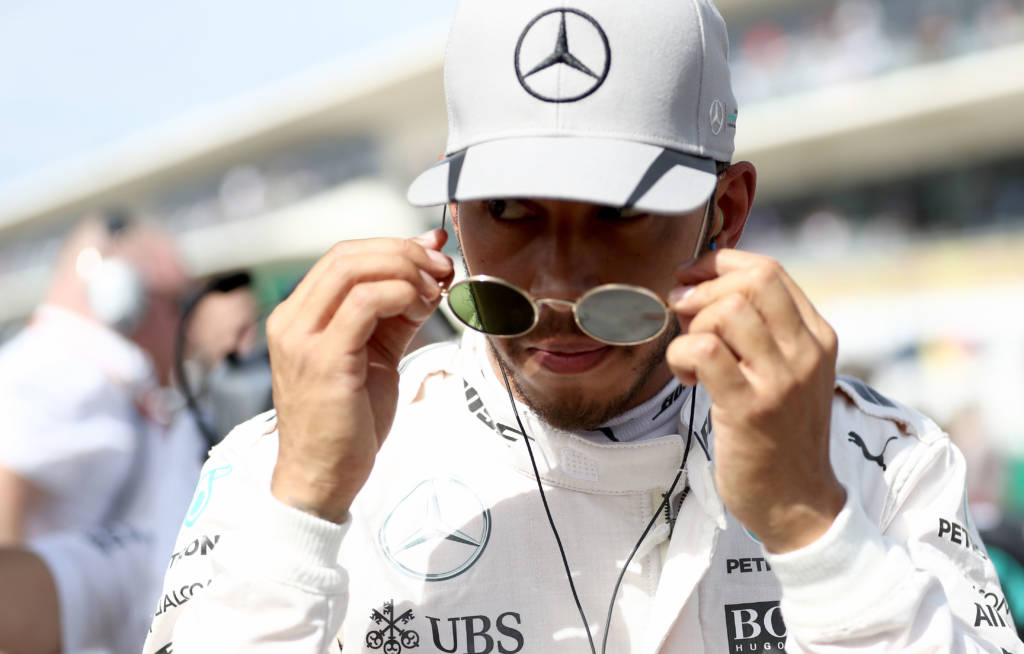 AUSTIN, TX - OCTOBER 23: Lewis Hamilton of Great Britain and Mercedes GP gets ready on the grid before the United States Formula One Grand Prix at Circuit of The Americas on October 23, 2016 in Austin, United States. Lars Baron/Getty Images/AFP