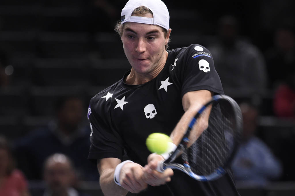 Germany's Jan-Lennard Struff returns the ball to Switzerland's Stan Wawrinka during their second round tennis match at the ATP World Tour Masters 1000 indoor tournament in Paris on November 2, 2016. / AFP PHOTO / MIGUEL MEDINA