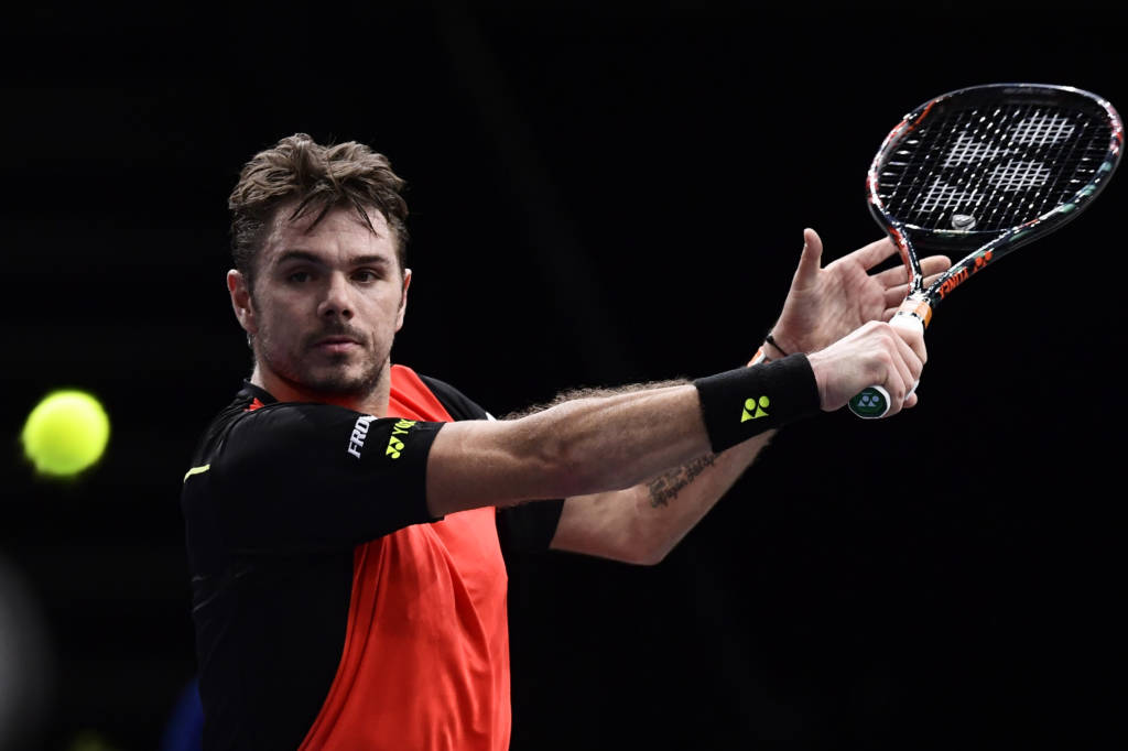 Switzerland's Stan Wawrinka returns the ball to Germany's Jan-Lennard Struff during their second round tennis match at the ATP World Tour Masters 1000 indoor tournament in Paris on November 2, 2016. / AFP PHOTO / MIGUEL MEDINA