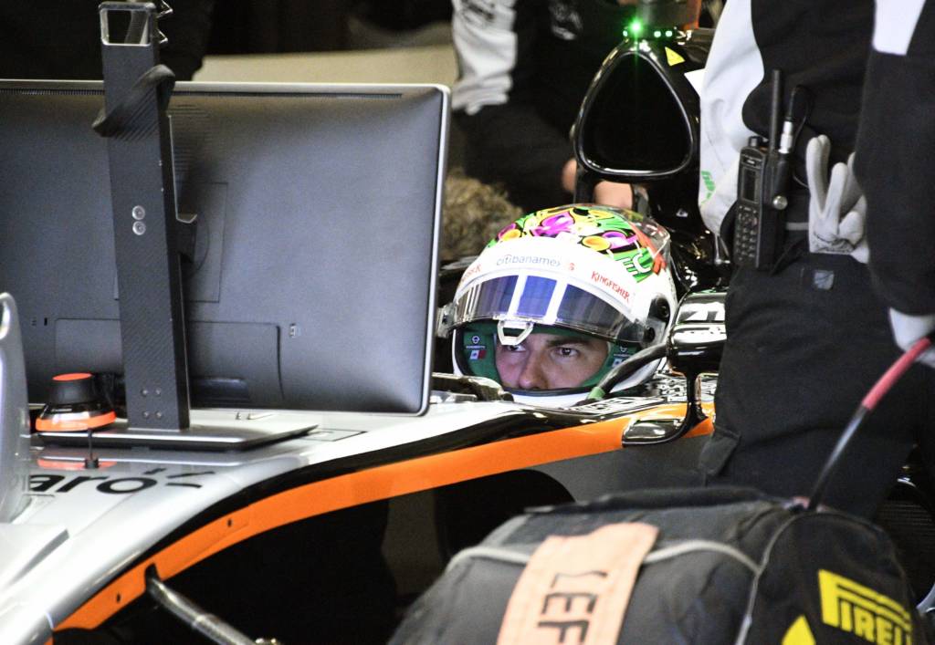 Sahara Force India F1 Team Mexican driver Sergio Perez is seen at the pits area during the Formula One Mexico Grand Prix practice session at the Hermanos Rodriguez circuit in Mexico City on October 29, 2016. / AFP PHOTO / ALFREDO ESTRELLA