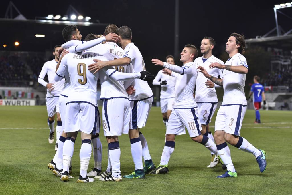 Italy's players celebrates after the first goal during the FIFA World Cup 2018 European group G Qualifiers football match beetween Liechtenstein and Italy on November 12, 2016 at the Rheinpark Stadion in Vaduz. / AFP PHOTO / FABRICE COFFRINI