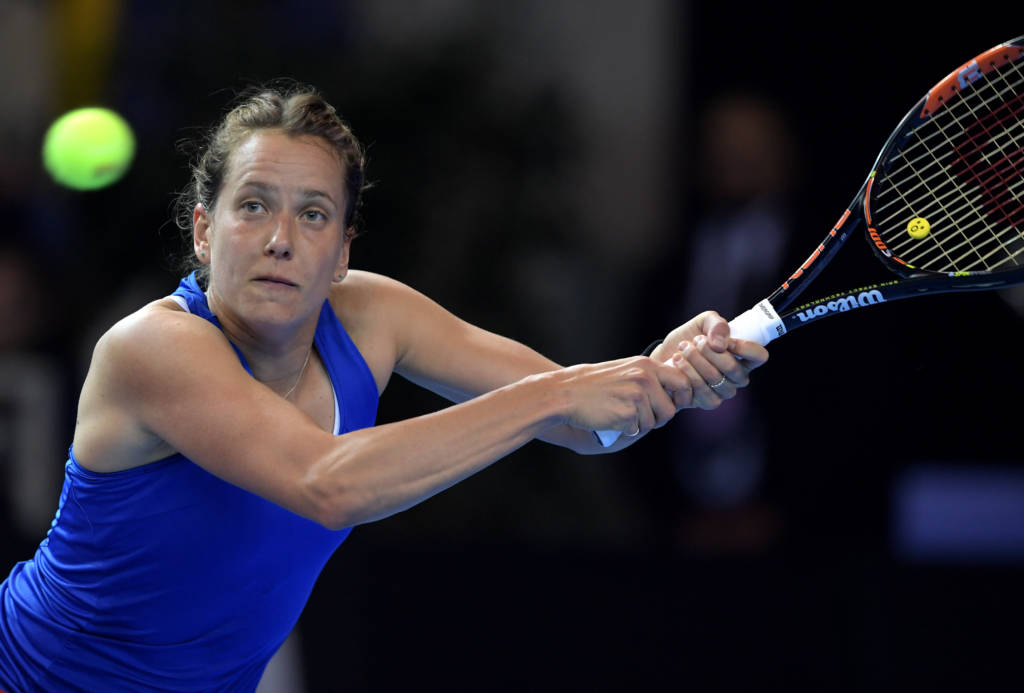 Czech Republic's Barbara Strycova returns the ball to France's Alize Cornet, on November 13, 2016 in Strasbourg, eastern France, during their Fed Cup final tennis match between France and Czech Republic. / AFP PHOTO / PATRICK HERTZOG