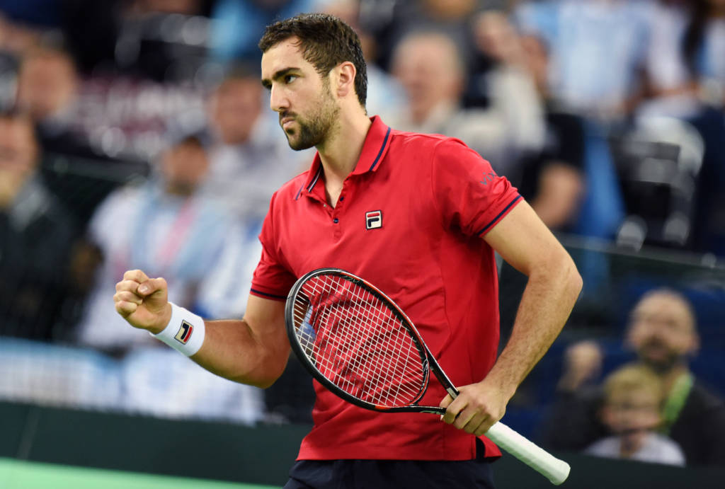 Croatia's Marin Cilic reacts after scoring against Argentina's Federico Delbonis during the Davis Cup World Group final singles match between Croatia and Argentina at the Arena hall in Zagreb, on November 25, 2016. / AFP PHOTO / STRINGER