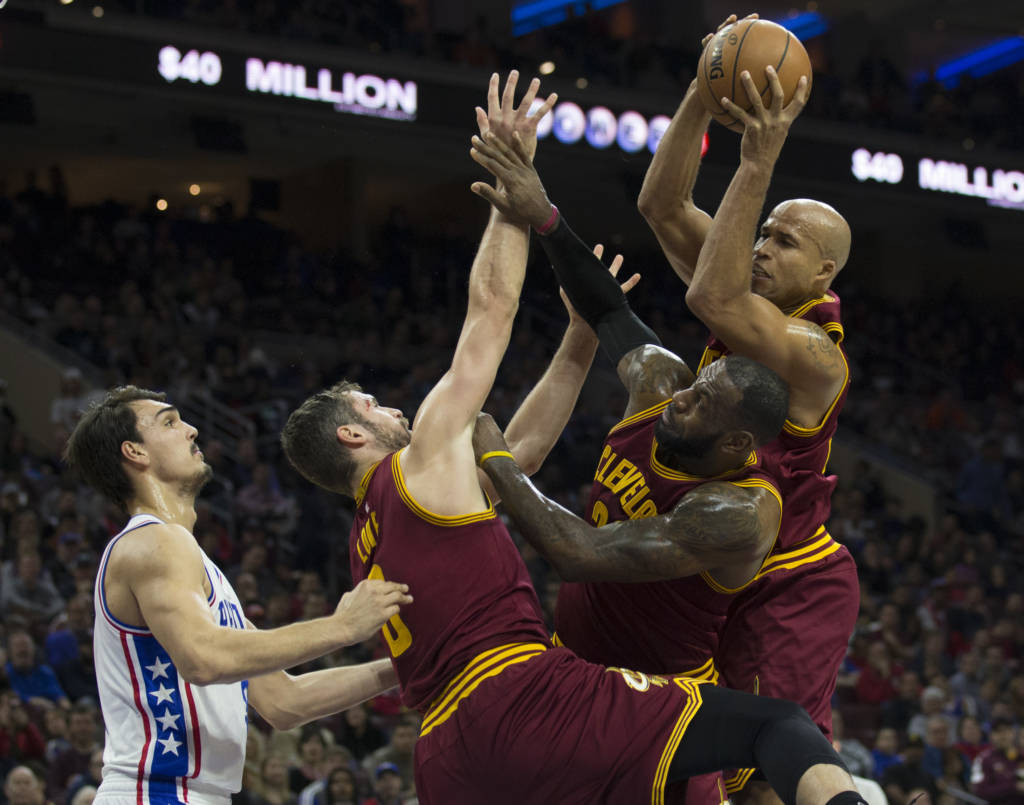 PHILADELPHIA, PA - NOVEMBER 27: Richard Jefferson #24, LeBron James #23, and Kevin Love #0 of the Cleveland Cavaliers go up for a rebound in the first quarter against Dario Saric #9 the Philadelphia 76ers at Wells Fargo Center on November 27, 2016 in Philadelphia, Pennsylvania. NOTE TO USER: User expressly acknowledges and agrees that, by downloading and or using this photograph, User is consenting to the terms and conditions of the Getty Images License Agreement. Mitchell Leff/Getty Images/AFP