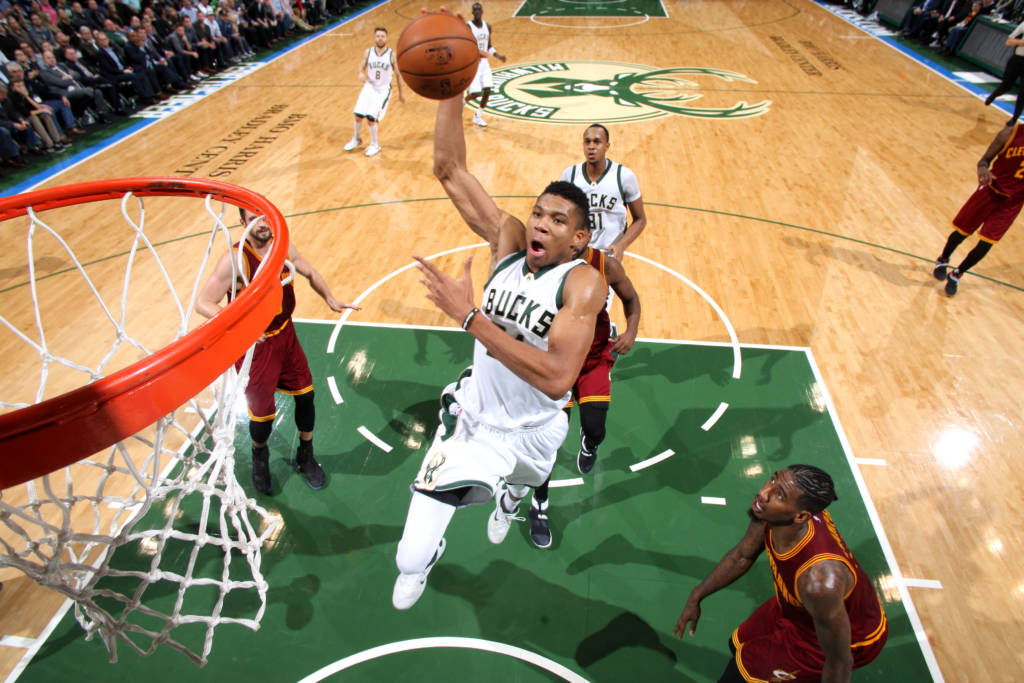 Milwaukee, WI - NOVEMBER 29: Giannis Antetokounmpo #34 of the Milwaukee Bucks goes for the dunk during the game against the Cleveland Cavaliers on November 29, 2016 at the BMO Harris Bradley Center in Milwaukee, Wisconsin. NOTE TO USER: User expressly acknowledges and agrees that, by downloading and or using this Photograph, user is consenting to the terms and conditions of the Getty Images License Agreement. Mandatory Copyright Notice: Copyright 2016 NBAE Gary Dineen/NBAE via Getty Images/AFP