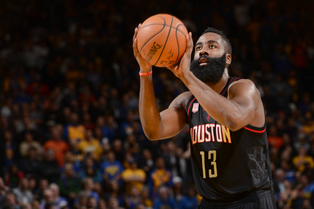 OAKLAND, CA - DECEMBER 1: James Harden #13 of the Houston Rockets shoots a free throw during a game against the Golden State Warriors on December 1, 2016 at ORACLE Arena in Oakland, California. NOTE TO USER: User expressly acknowledges and agrees that, by downloading and/or using this photograph, user is consenting to the terms and conditions of Getty Images License Agreement. Mandatory Copyright Notice: Copyright 2016 NBAE   Noah Graham/NBAE via Getty Images/AFP