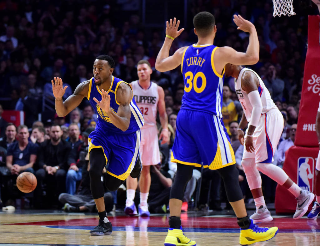 LOS ANGELES, CA - DECEMBER 07: Andre Iguodala #9 of the Golden State Warriors celebrates his dunk with Stephen Curry #30 during a 115-98 win over the LA Clippers at Staples Center on December 7, 2016 in Los Angeles, California. NOTE TO USER: User expressly acknowledges and agrees that, by downloading and or using this photograph, User is consenting to the terms and conditions of the Getty Images License Agreement.   Harry How/Getty Images/AFP