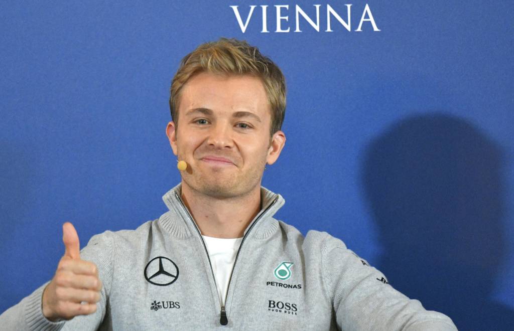 Formula One World champion Germany's Nico Rosberg gives a press conference where he announced to end his F1 career during the FIA Prize Giving Gala at the Hofburg palace in Vienna, Austria on December 2, 2016. / AFP PHOTO / APA / HERBERT NEUBAUER / Austria OUT