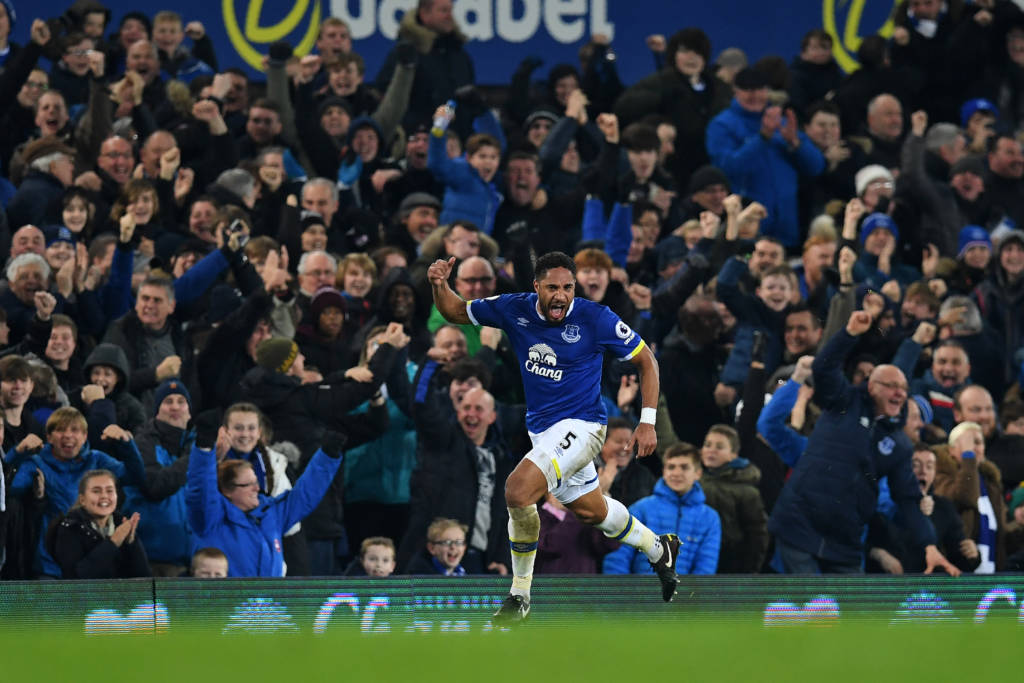 Everton's English-born Welsh defender Ashley Williams celebrates scoring his team's second goal during the English Premier League football match between Everton and Arsenal at Goodison Park in Liverpool, north west England on December 13, 2016. / AFP PHOTO / Paul ELLIS / RESTRICTED TO EDITORIAL USE. No use with unauthorized audio, video, data, fixture lists, club/league logos or 'live' services. Online in-match use limited to 75 images, no video emulation. No use in betting, games or single club/league/player publications. /