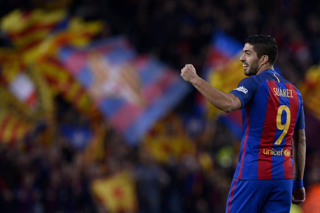 Suárez marcou dois dos quatro gols do Barcelona sobre o Espanyol (foto: Josep Lago/AFP)