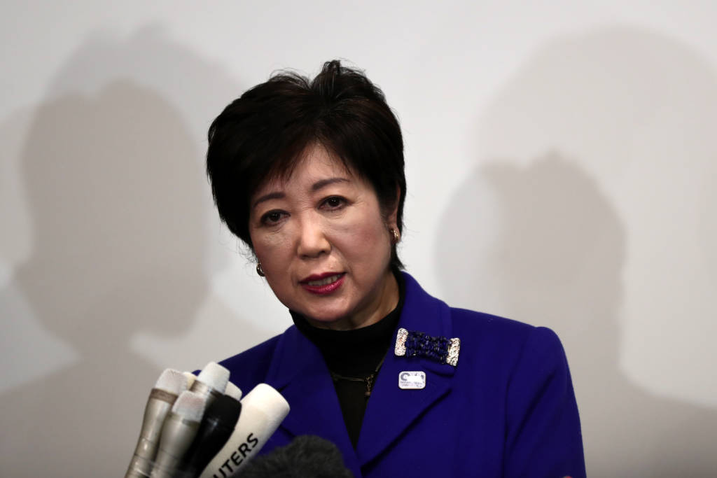 Tokyo Governor Yuriko Koike speaks to the media after a Four-Party Working Group meeting to present the first official cost estimate for the 2020 Tokyo Games in Tokyo on December 21, 2016.  The 2020 Olympics in Tokyo will likely cost as much as 17 billion USD, the organising committee said December 21, an estimate reflecting intense efforts to cut costs that had threatened to spiral out of control. / AFP PHOTO / Behrouz MEHRI