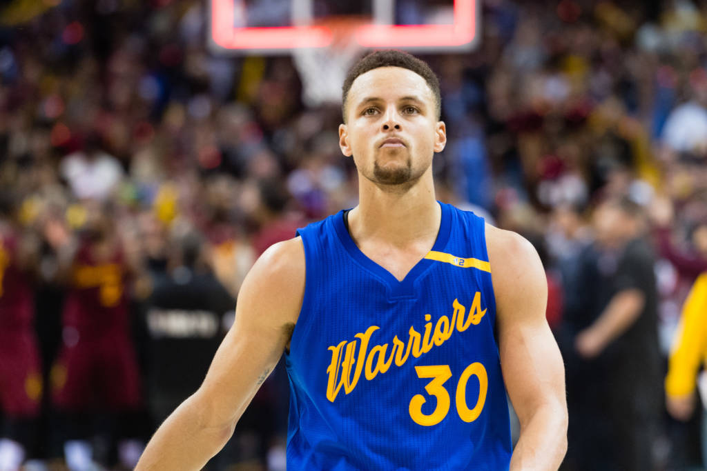 CLEVELAND, OH - DECEMBER 25: Stephen Curry #30 of the Golden State Warriors reacts as he walks off the court after the Golden State Warriors lost to the Cleveland Cavaliers at Quicken Loans Arena on December 25, 2016 in Cleveland, Ohio. The Cavaliers defeated the Warriors 109-108. NOTE TO USER: User expressly acknowledges and agrees that, by downloading and/or using this photograph, user is consenting to the terms and conditions of the Getty Images License Agreement. Mandatory copyright notice. Jason Miller/Getty Images/AFP