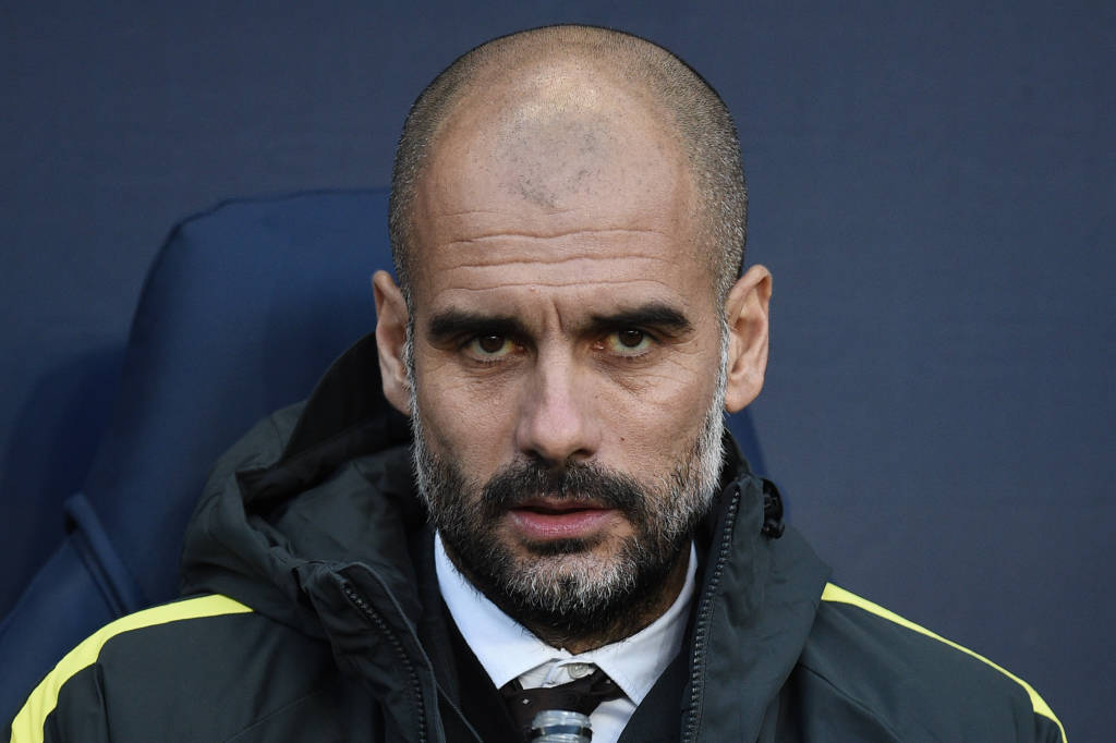 Manchester City's Spanish manager Pep Guardiola reacts ahead of the English Premier League football match between Manchester City and Burnley at the Etihad Stadium in Manchester, north west England, on January 2, 2017. / AFP PHOTO / Oli SCARFF / RESTRICTED TO EDITORIAL USE. No use with unauthorized audio, video, data, fixture lists, club/league logos or 'live' services. Online in-match use limited to 75 images, no video emulation. No use in betting, games or single club/league/player publications.  /
