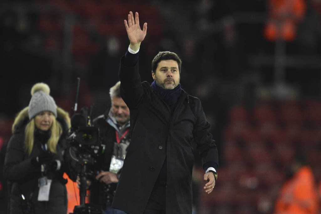 Tottenham Hotspur's Argentinian head coach Mauricio Pochettino waves at the end of the English Premier League football match between Southampton and Tottenham Hotspur at St Mary's Stadium in Southampton, southern England on December 28, 2016. / AFP PHOTO / Glyn KIRK / RESTRICTED TO EDITORIAL USE. No use with unauthorized audio, video, data, fixture lists, club/league logos or 'live' services. Online in-match use limited to 75 images, no video emulation. No use in betting, games or single club/league/player publications.  /