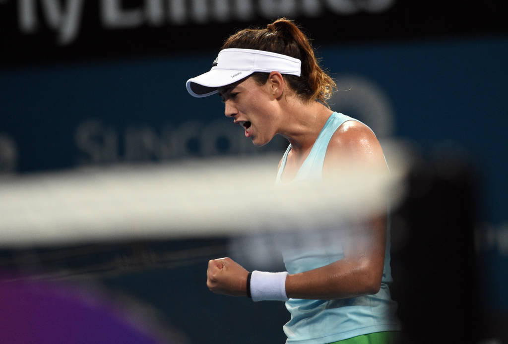 Garbine Muguruza of Spain celebrates a point against Daria Kasatkina of Russia in their women's second round match at the Brisbane International tennis tournament in Brisbane on January 3, 2017. / AFP PHOTO / SAEED KHAN / IMAGE RESTRICTED TO EDITORIAL USE - STRICTLY NO COMMERCIAL USE
