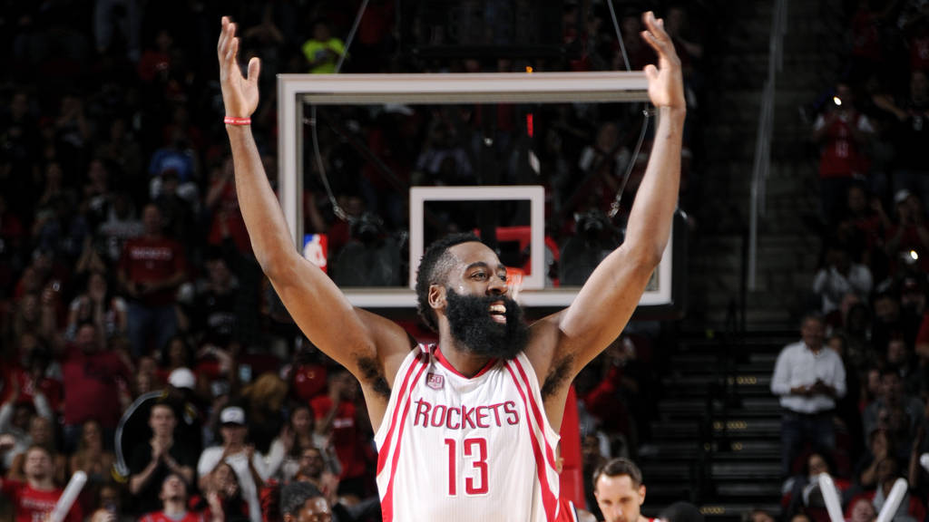 HOUSTON, TX - JANUARY 2: James Harden #13 of the Houston Rockets reacts after getting his 9th Triple-Double during the game against the Washington Wizards on January 2, 2017 at the Toyota Center in Houston, Texas. NOTE TO USER: User expressly acknowledges and agrees that, by downloading and or using this photograph, User is consenting to the terms and conditions of the Getty Images License Agreement. Mandatory Copyright Notice: Copyright 2017 NBAE   Bill Baptist/NBAE via Getty Images/AFP