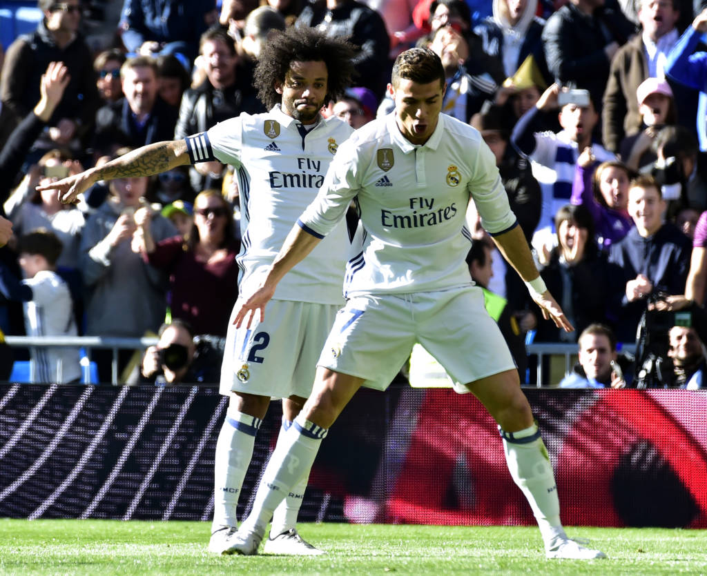 Pilares do Real Madrid, Cristiano Ronaldo e Marcelo comemoram tarde inesquecível (Foto: Gerard Julien/AFP)