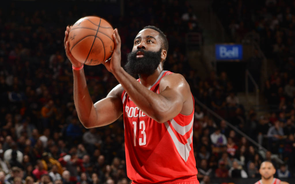 TORONTO, CANADA - JANUARY 8: James Harden #13 of the Houston Rockets shoots a free throw during a game against the Toronto Raptors on January 8, 2017 at the Air Canada Centre in Toronto, Ontario, Canada. NOTE TO USER: User expressly acknowledges and agrees that, by downloading and/or using this photograph, user is consenting to the terms and conditions of the Getty Images License Agreement. Mandatory Copyright Notice: Copyright 2017 NBAE   Ron Turenne/NBAE via Getty Images/AFP