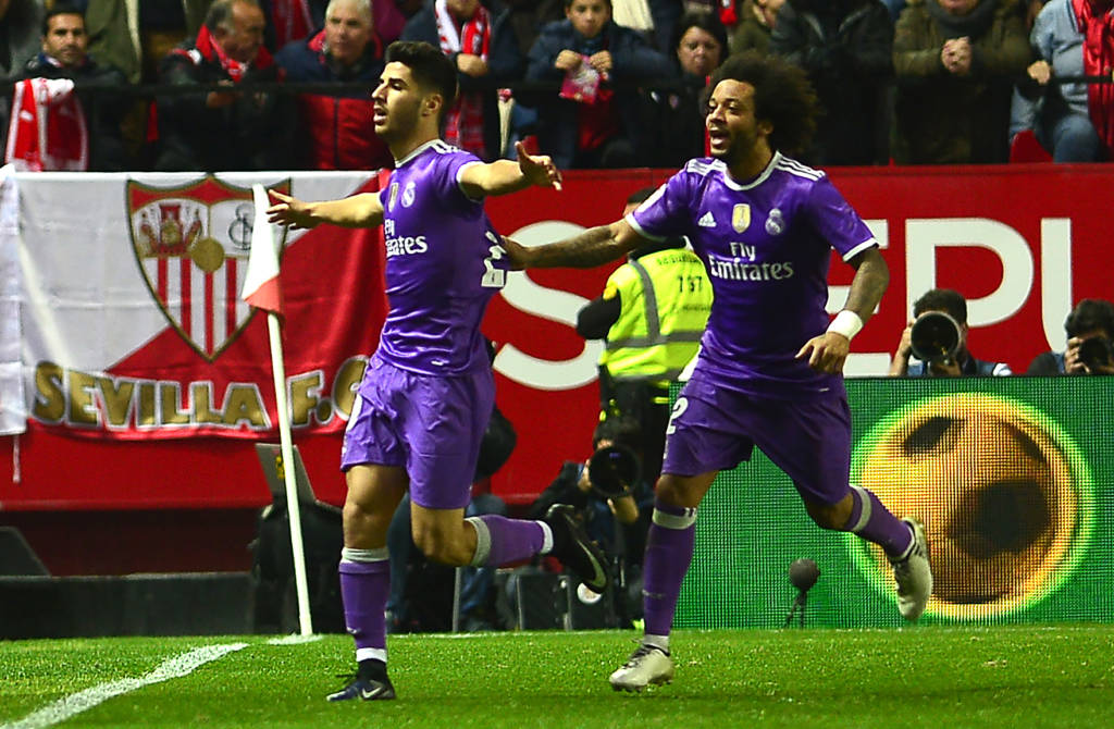 Asensio marcou o primeiro gol do Real Madrid e Marcelo participou do terceiro (Foto: CRISTINA QUICLER / AFP)