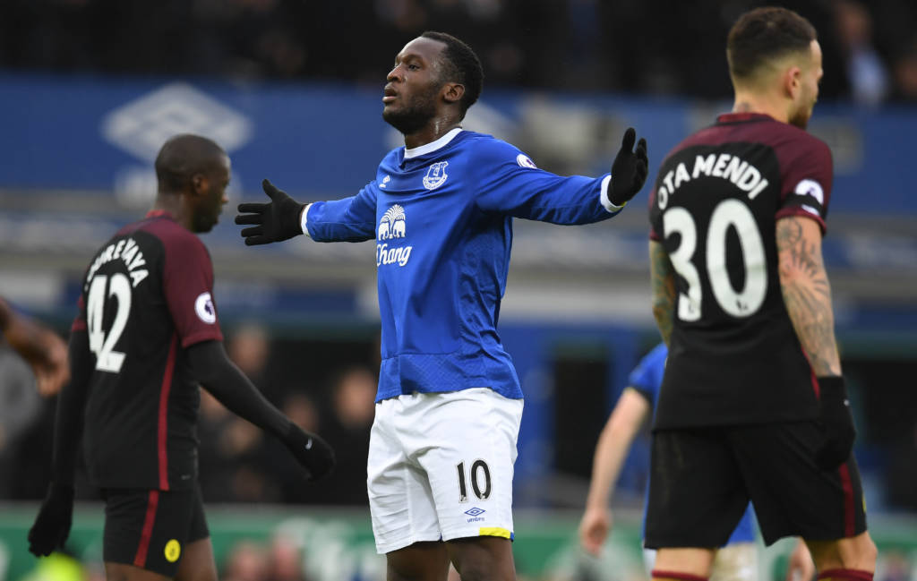Everton's Belgian striker Romelu Lukaku (C) celebrates after scoring the opening goal of the English Premier League football match between Everton and Manchester City at Goodison Park in Liverpool, north-west England on January 15, 2017. / AFP PHOTO / Paul ELLIS / RESTRICTED TO EDITORIAL USE. No use with unauthorized audio, video, data, fixture lists, club/league logos or 'live' services. Online in-match use limited to 75 images, no video emulation. No use in betting, games or single club/league/player publications. /
