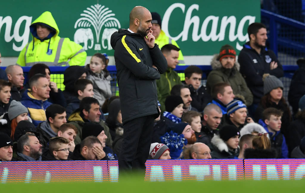 Manchester City's Spanish manager Pep Guardiola (C) gestures on the touchline during the English Premier League football match between Everton and Manchester City at Goodison Park in Liverpool, north-west England on January 15, 2017. Everton won the match 4-0. / AFP PHOTO / Paul ELLIS / RESTRICTED TO EDITORIAL USE. No use with unauthorized audio, video, data, fixture lists, club/league logos or 'live' services. Online in-match use limited to 75 images, no video emulation. No use in betting, games or single club/league/player publications.  /