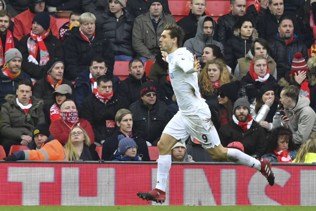 Swansea City's Spanish striker Fernando Llorente celebrates scoring a goal during the English Premier League football match between Liverpool and Swansea City at Anfield in Liverpool, north west England on January 21, 2017. / AFP PHOTO / Anthony DEVLIN / RESTRICTED TO EDITORIAL USE. No use with unauthorized audio, video, data, fixture lists, club/league logos or 'live' services. Online in-match use limited to 75 images, no video emulation. No use in betting, games or single club/league/player publications. /