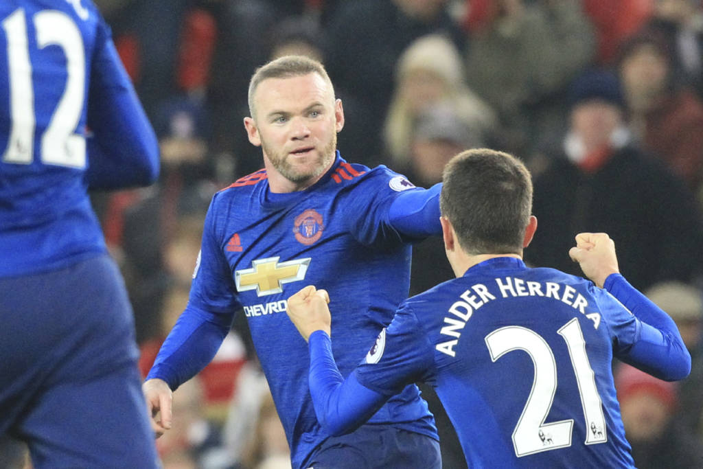 Rooney se isolou como artilheiro máximo da história do United (Foto: Lindsey Parnaby/AFP)