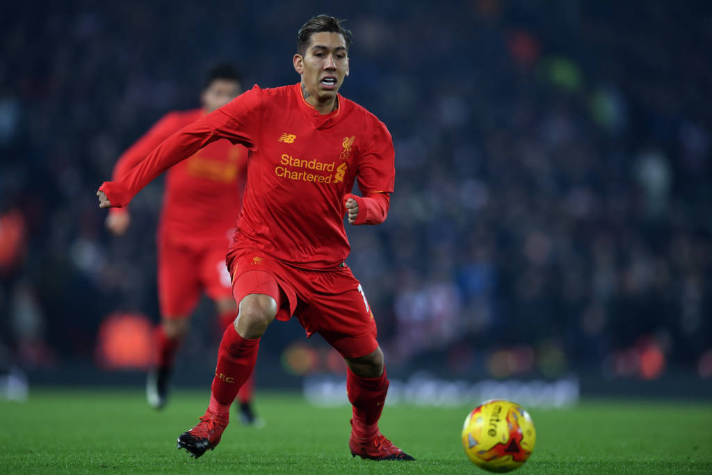 Liverpool's Brazilian midfielder Roberto Firmino controls the ball during the EFL (English Football League) Cup semi-final second-leg football match between Liverpool and Southampton at Anfield in Liverpool, north west England on January 25, 2017. / AFP PHOTO / Paul ELLIS / RESTRICTED TO EDITORIAL USE. No use with unauthorized audio, video, data, fixture lists, club/league logos or 'live' services. Online in-match use limited to 75 images, no video emulation. No use in betting, games or single club/league/player publications.  /