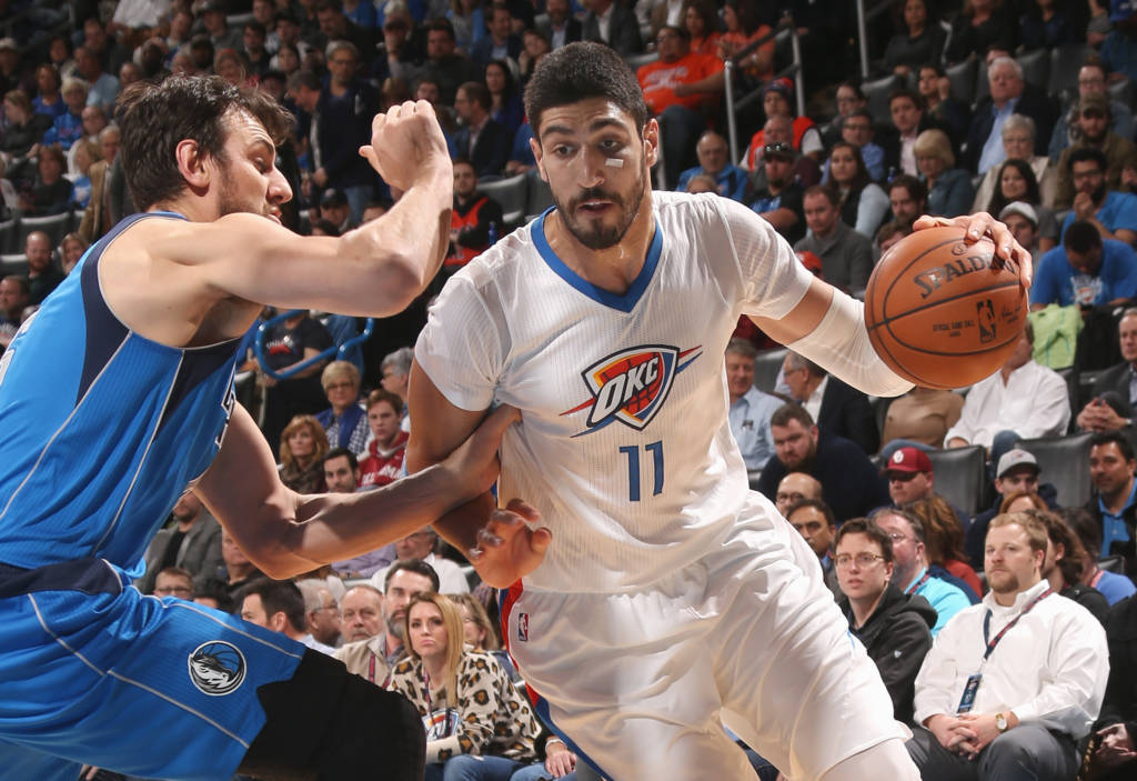 OKLAHOMA CITY, OK - JANUARY 26: Enes Kanter #11 of the Oklahoma City Thunder drives to the basket against the Dallas Mavericks on January 26, 2017 at Chesapeake Energy Arena in Oklahoma City, Oklahoma. NOTE TO USER: User expressly acknowledges and agrees that, by downloading and or using this photograph, User is consenting to the terms and conditions of the Getty Images License Agreement. Mandatory Copyright Notice: Copyright 2017 NBAE   Layne Murdoch/NBAE via Getty Images/AFP
