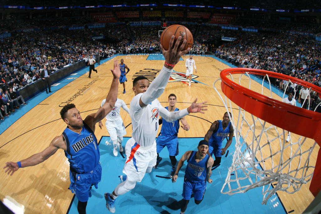 OKLAHOMA CITY, OK - JANUARY 26: Russell Westbrook #0 of the Oklahoma City Thunder goes up for a lay up against the Dallas Mavericks on January 26, 2017 at Chesapeake Energy Arena in Oklahoma City, Oklahoma. NOTE TO USER: User expressly acknowledges and agrees that, by downloading and or using this photograph, User is consenting to the terms and conditions of the Getty Images License Agreement. Mandatory Copyright Notice: Copyright 2017 NBAE Layne Murdoch/NBAE via Getty Images/AFP