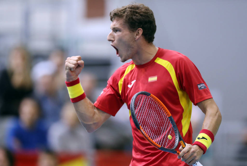 Spain's Pablo Carreno Busta reacts after scoring against Croatia's Nikola Mektic during the first-round Davis Cup tennis match between Croatia and Spain at Gradski vrt hall in Osijek on February 5, 2017. / AFP PHOTO / STRINGER