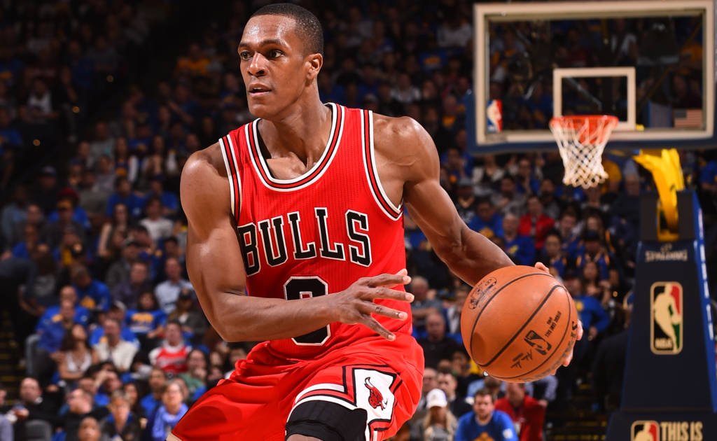 OAKLAND, CA - FEBRUARY 8: Rajon Rondo #9 of the Chicago Bulls handles the ball against the Golden State Warriors on February 8, 2017 at ORACLE Arena in Oakland, California. NOTE TO USER: User expressly acknowledges and agrees that, by downloading and or using this photograph, user is consenting to the terms and conditions of Getty Images License Agreement. Mandatory Copyright Notice: Copyright 2017 NBAE   Noah Graham/NBAE via Getty Images/AFP