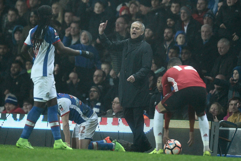 Manchester United's Portuguese manager Jose Mourinho (C) gestures on the touchline during the English FA Cup fifth round football match between Blackburn Rovers and Manchester United at Ewood Park in Blackburn, north west England on February 19, 2017. / AFP PHOTO / Oli SCARFF / RESTRICTED TO EDITORIAL USE. No use with unauthorized audio, video, data, fixture lists, club/league logos or 'live' services. Online in-match use limited to 75 images, no video emulation. No use in betting, games or single club/league/player publications.  /