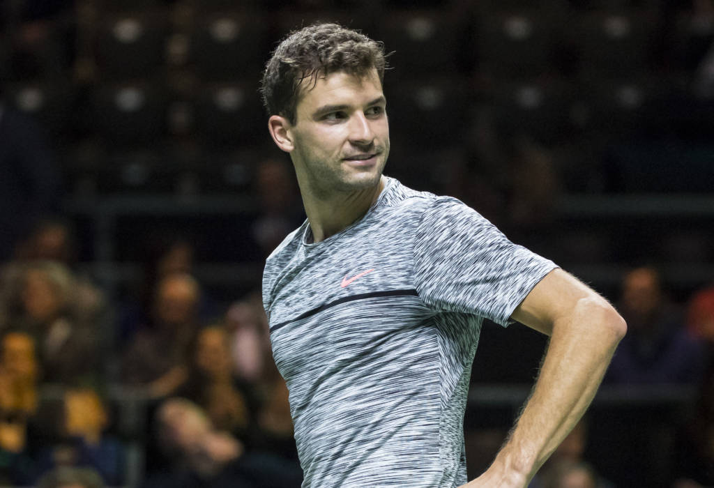 Bulgaria's Grigor Dimitrov reacts after a point against Uzbekistan's Denis Istomin during the second round of the Rotterdam World Tennis ATP tournament in Rotterdam on February 16, 2017.  / AFP PHOTO / ANP / Koen SUYK / Netherlands OUT