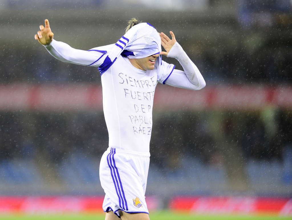 Real Sociedad's forward Juanmi Jimenez celebrates after scoring his team's first goal during the Spanish league football match Real Sociedad vs SD Eibar at the Anoeta stadium in San Sebastian on February 28, 2017. / AFP PHOTO / ANDER GILLENEA