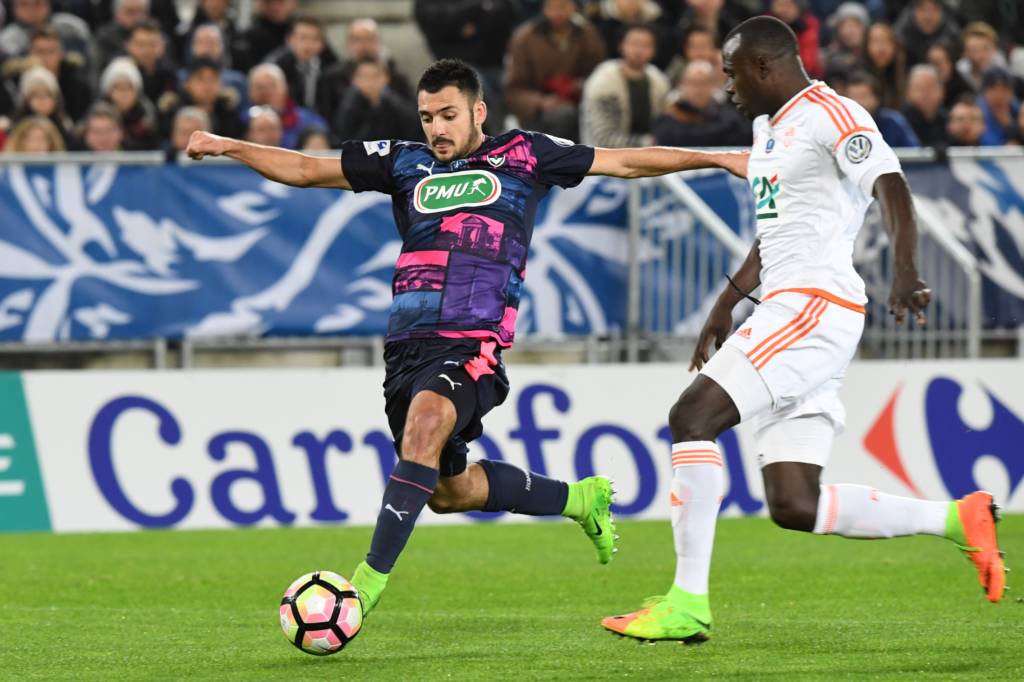 Bordeaux's Gaetan Laborde (L) vies with Lorient's Toure Zargo (R) during the French Cup football match between FCG Bordeaux and FC Lorient on February 28, 2017 at the Matmut Stadium in Bordeaux, southwestern France. / AFP PHOTO / MEHDI FEDOUACH / The erroneous mention[s] appearing in the metadata of this photo by MEHDI FEDOUACH has been modified in AFP systems in the following manner: [Bordeaux's Gaetan Laborde (L) vies with Lorient's Toure Zargo (R) during the French Cup football match between FCG Bordeaux and FC Lorient on February 28, 2017 at the Matmut Stadium in Bordeaux, southwestern France.] instead of [Bordeaux's Gaetan Laborde (L) vies with Lorient's Toure Zargo (R) during the Italian Tim Cup football match between Juventus and Napoli on February 28, 2017, at the Juventus Stadium in Turin.]. Please immediately remove the erroneous mention[s] from all your online services and delete it (them) from your servers. If you have been authorized by AFP to distribute it (them) to third parties, please ensure that the same actions are carried out by them. Failure to promptly comply with these instructions will entail liability on your part for any continued or post notification usage. Therefore we thank you very much for all your attention and prompt action. We are sorry for the inconvenience this notification may cause and remain at your disposal for any further information you may require.