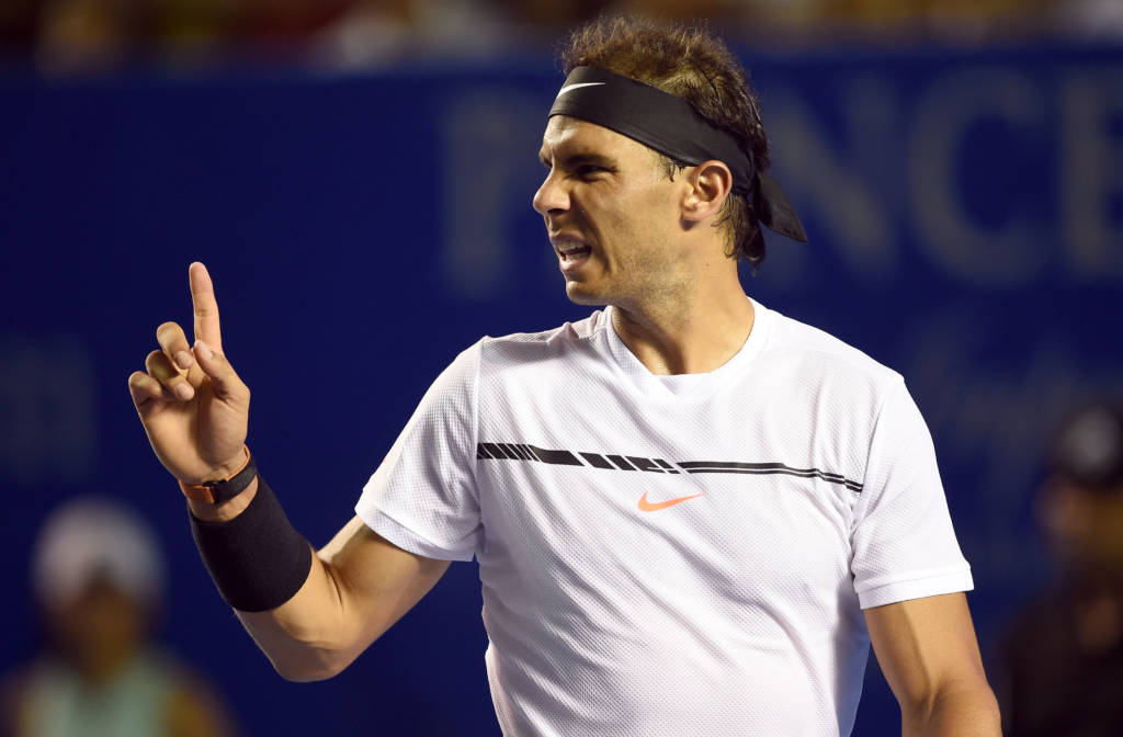 Spanish tennis player Rafael Nadal talks with the judge during the second day of the Mexican Tennis Open, in Acapulco, Guerrero State, Mexico, on February 28, 2017. / AFP PHOTO / ALFREDO ESTRELLA