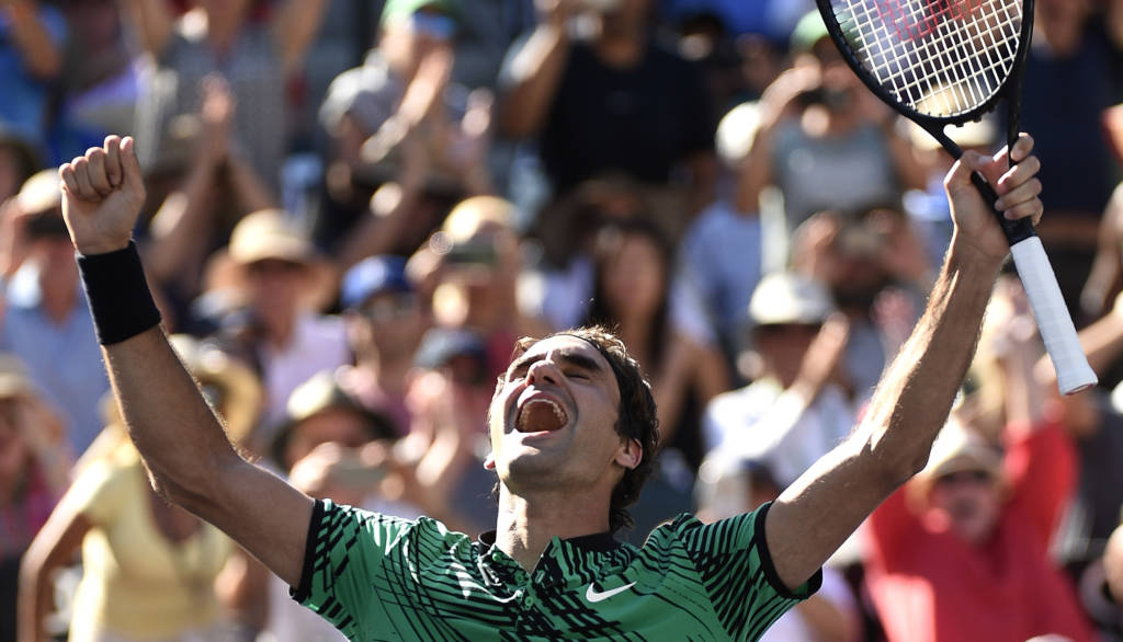INDIAN WELLS, CA - MARCH 19: Roger Federer of Switzerland celebrates after defeating Stanislas Wawrinka of Switzerland in the mens final during day fourteen of the BNP Paribas Open at Indian Wells Tennis Garden on March 19, 2017 in Indian Wells, California. Kevork Djansezian/Getty Images/AFP