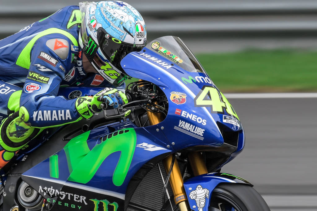 Movistar Yamaha MotoGP's Italian rider Valentino Rossi rides his bike during the second day of the 2017 MotoGP pre-season test at the Sepang International Circuit on January 31, 2017. / AFP PHOTO / Mohd RASFAN